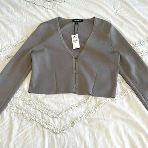 Im selling a beige sweater that is from express and it is a extra small